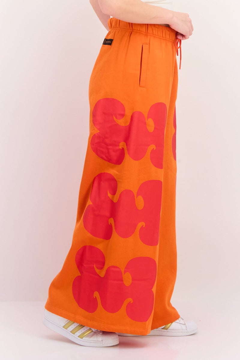 Adidas سروال خارجي فضفاض للنساء من ماريميكو، برتقالي - Image 2